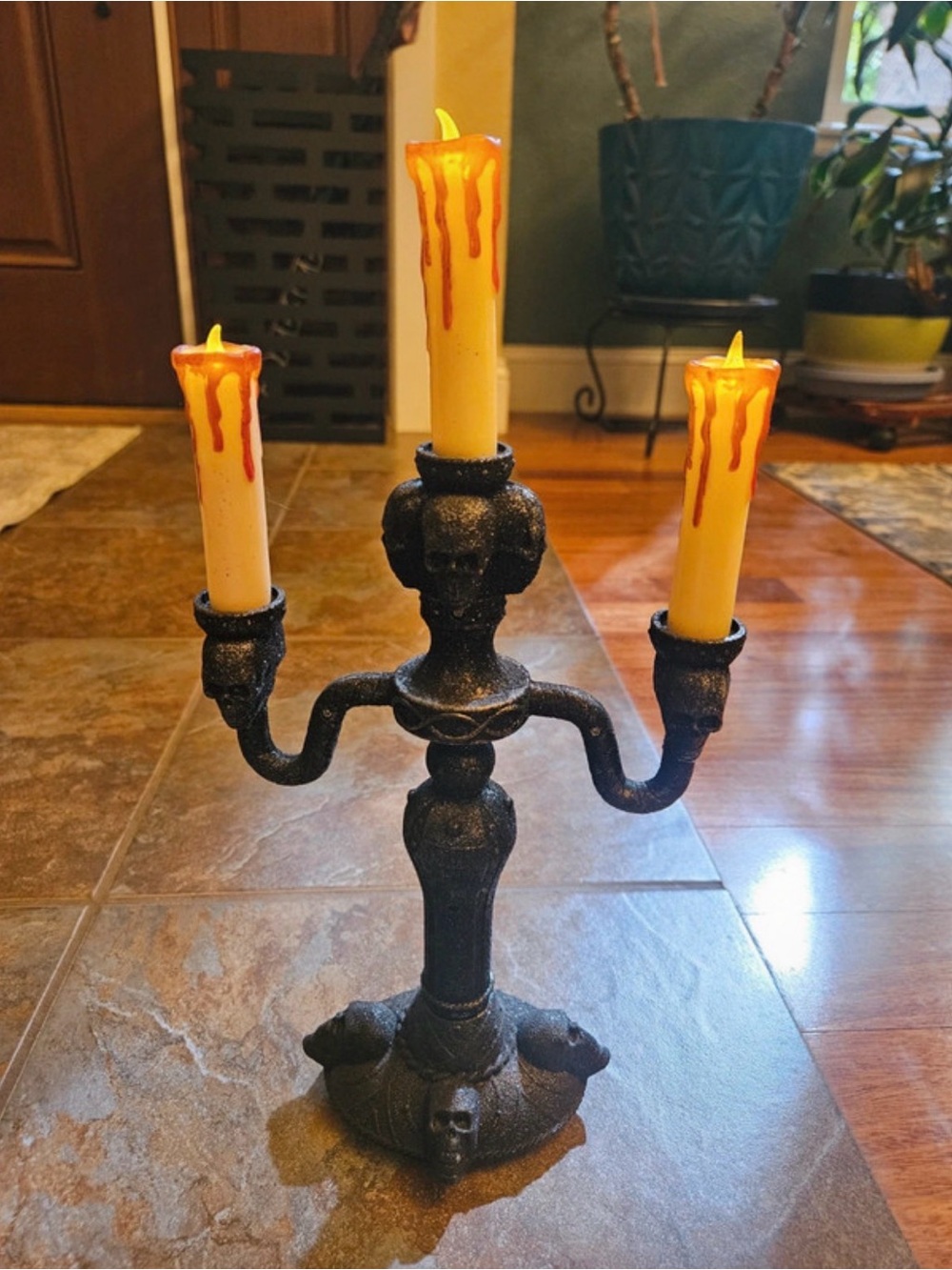 Black Gothic Skull 3-Arm Candle Holder with Dripping Yellow Candles